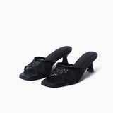 Carina negro mules de cuero y malla