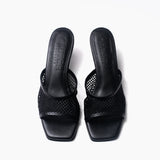 Carina negro mules de cuero y malla