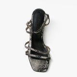 Lola sandalias de cuero pitón gris