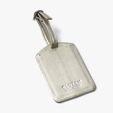 Tag de cuero para maleta dorado